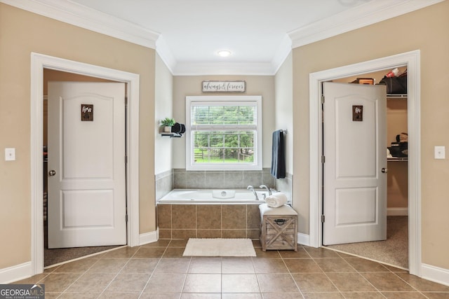 3480 Indian Shoals Rd, Dacula, GA 30019 - full bath with tile patterned flooring, a bath, ornamental molding, and baseboards