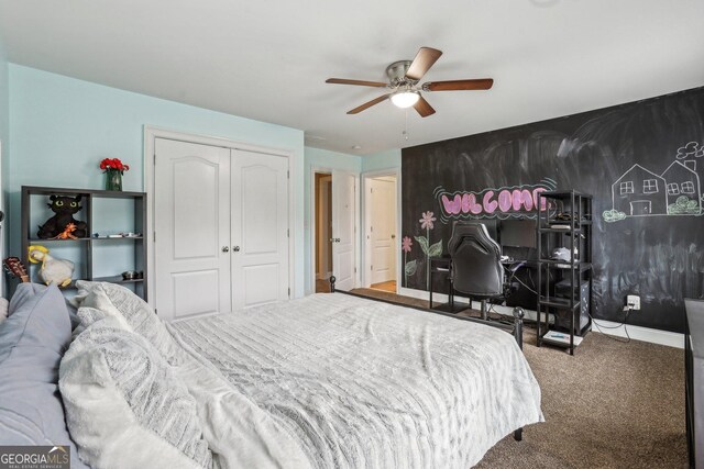 3480 Indian Shoals Rd, Dacula, GA 30019 - bedroom with carpet floors, a closet, and a ceiling fan