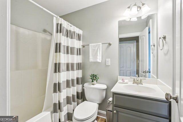3480 Indian Shoals Rd, Dacula, GA 30019 - bathroom with toilet, vanity, shower / tub combo, and baseboards