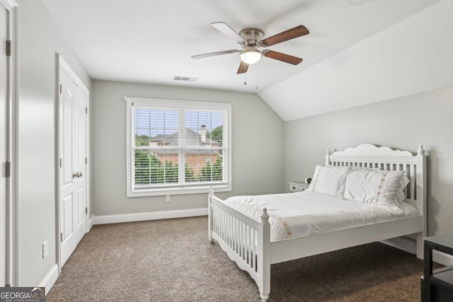 3480 Indian Shoals Rd, Dacula, GA 30019 - bedroom with carpet, lofted ceiling, and a ceiling fan