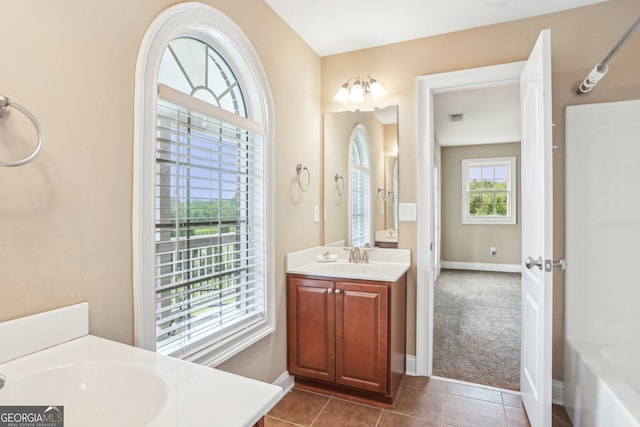 3480 Indian Shoals Rd, Dacula, GA 30019 - bathroom with vanity and tile patterned flooring