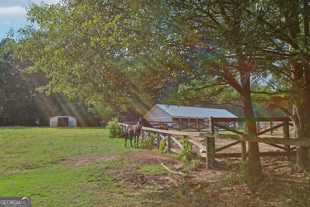 3480 Indian Shoals Rd, Dacula, GA 30019 - view of green lawn featuring a storage shed