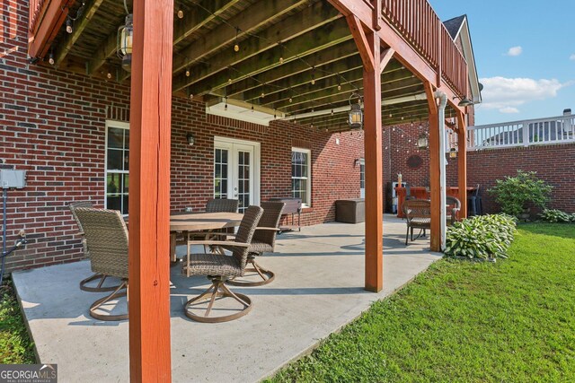 3480 Indian Shoals Rd, Dacula, GA 30019 - view of patio with french doors and outdoor dining area