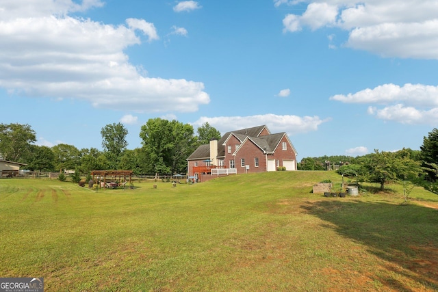 3480 Indian Shoals Rd, Dacula, GA 30019 - view of grassy yard featuring a garage