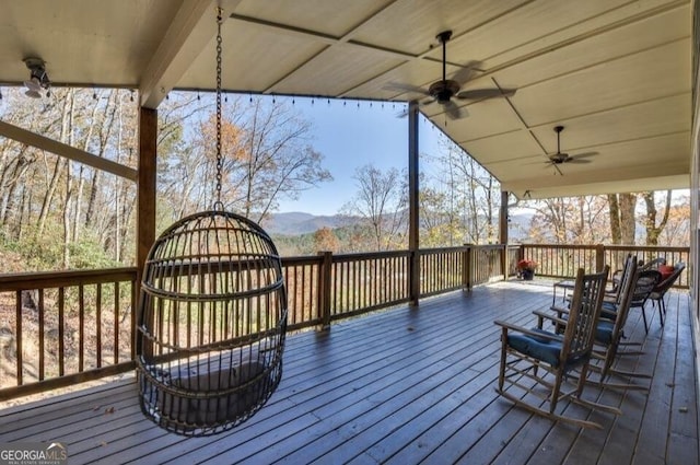 243 Degroff Ln, Rabun Gap, GA 30568 - wooden deck with ceiling fan and a mountain view