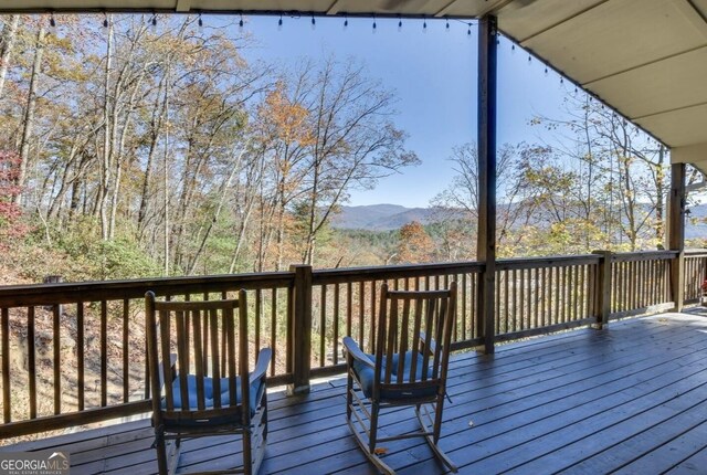 243 Degroff Ln, Rabun Gap, GA 30568 - wooden terrace with a mountain view