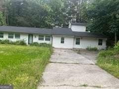 3785 Somerset Dr SW, Marietta, GA 30064 - view of front of home with concrete driveway and a front yard