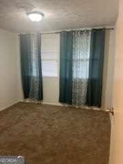 3785 Somerset Dr SW, Marietta, GA 30064 - unfurnished room with carpet flooring