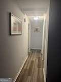 3785 Somerset Dr SW, Marietta, GA 30064 - hallway with wood finished floors