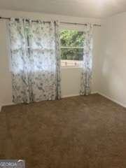 3785 Somerset Dr SW, Marietta, GA 30064 - view of carpeted empty room