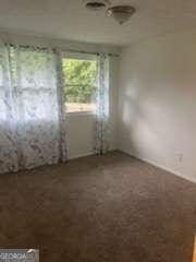 3785 Somerset Dr SW, Marietta, GA 30064 - unfurnished room with carpet flooring