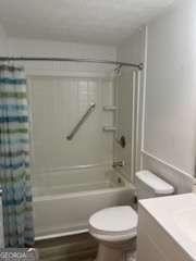 3785 Somerset Dr SW, Marietta, GA 30064 - full bathroom with shower / tub combo, vanity, toilet, and wood finished floors