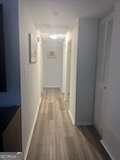 3785 Somerset Dr SW, Marietta, GA 30064 - hallway with wood finished floors