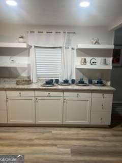 3785 Somerset Dr SW, Marietta, GA 30064 - kitchen featuring light wood-style flooring and light countertops