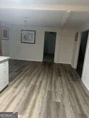 3785 Somerset Dr SW, Marietta, GA 30064 - unfurnished living room with wood finished floors