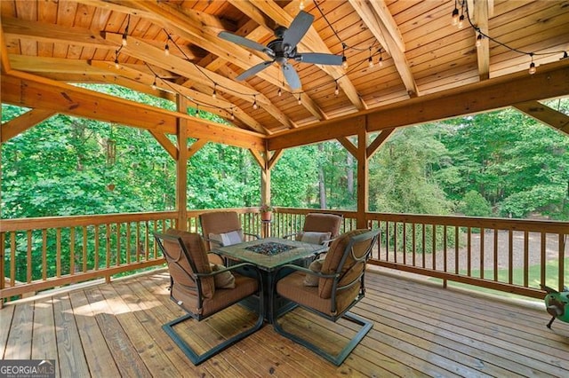 226 Nacoochee Dr, Woodstock, GA 30188 - wooden deck with ceiling fan and outdoor dining space