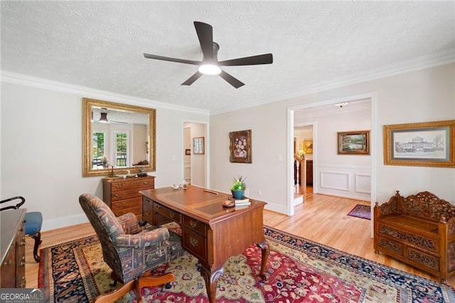 226 Nacoochee Dr, Woodstock, GA 30188 - office area with ceiling fan, light wood-style floors, ornamental molding, and a textured ceiling