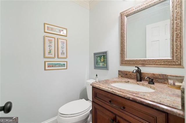 226 Nacoochee Dr, Woodstock, GA 30188 - half bathroom featuring vanity and ornamental molding