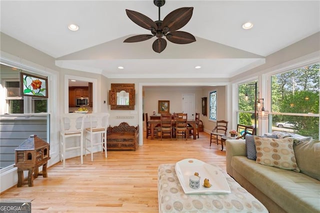 226 Nacoochee Dr, Woodstock, GA 30188 - living room with lofted ceiling, light wood-type flooring, a ceiling fan, recessed lighting, and crown molding