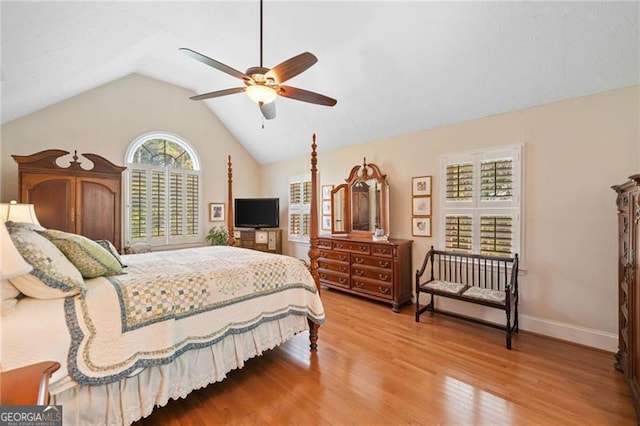 226 Nacoochee Dr, Woodstock, GA 30188 - bedroom featuring wood finished floors, lofted ceiling, and a ceiling fan