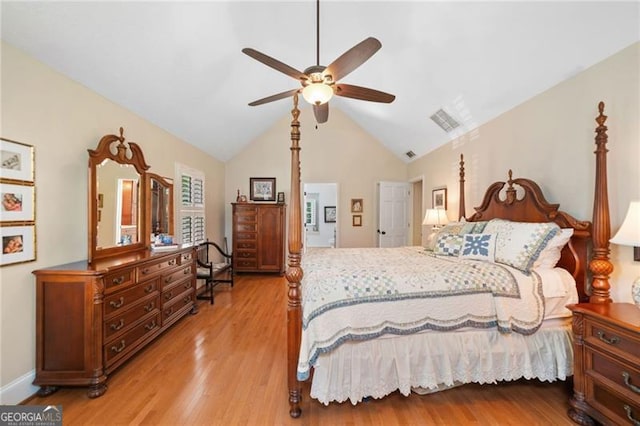 226 Nacoochee Dr, Woodstock, GA 30188 - bedroom with light wood finished floors, vaulted ceiling, and ceiling fan