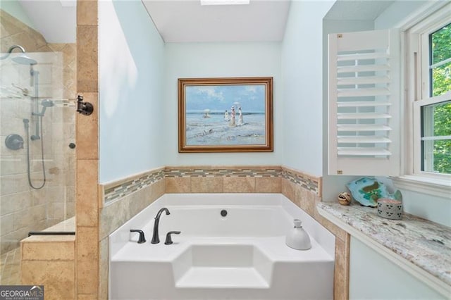 226 Nacoochee Dr, Woodstock, GA 30188 - full bathroom with a bath, healthy amount of natural light, and walk in shower