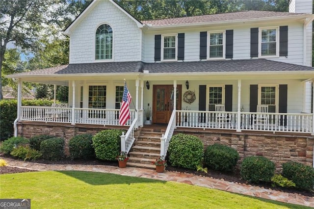 226 Nacoochee Dr, Woodstock, GA 30188 - view of front of home with a porch, a front lawn, a chimney, and a shingled roof
