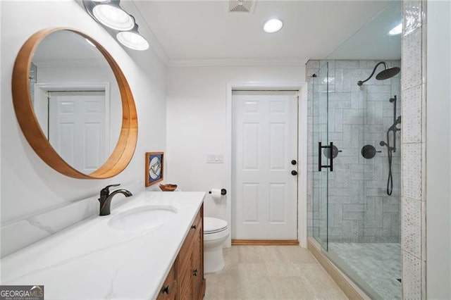 226 Nacoochee Dr, Woodstock, GA 30188 - bathroom with vanity, crown molding, a stall shower, and recessed lighting