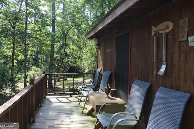 2879 Mcmillan Jernigan, Enigma, GA 31749 - wooden deck with a view of trees