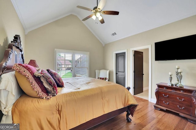 2450 Weber Heights Way, Buford, GA 30519 - bedroom featuring light wood-style floors, crown molding, vaulted ceiling, and ceiling fan