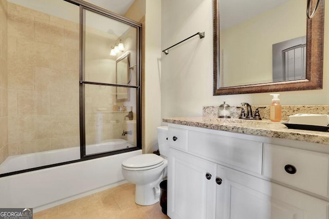 2450 Weber Heights Way, Buford, GA 30519 - bathroom with vanity, toilet, enclosed tub / shower combo, and tile patterned floors