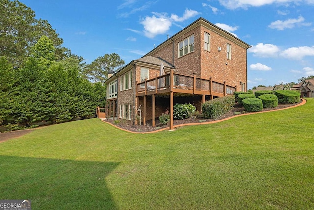 2450 Weber Heights Way, Buford, GA 30519 - rear view of house featuring brick siding, a wooden deck, and a yard