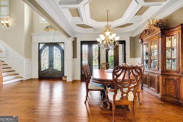 2450 Weber Heights Way, Buford, GA 30519 - dining room featuring french doors, a decorative wall, a chandelier, stairway, and ornamental molding