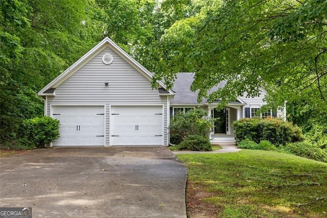 245 London Ln, Hiram, GA 30141 - ranch-style home with driveway, a garage, and a front yard