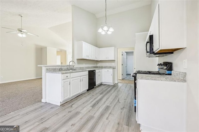 245 London Ln, Hiram, GA 30141 - kitchen featuring high vaulted ceiling, black appliances, a ceiling fan, white cabinetry, and light countertops
