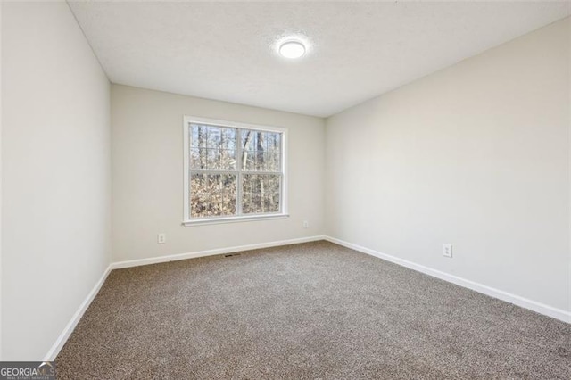 245 London Ln, Hiram, GA 30141 - carpeted spare room with baseboards