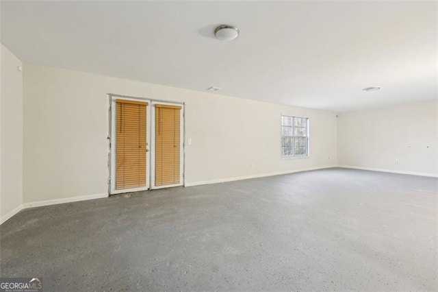245 London Ln, Hiram, GA 30141 - unfurnished room with baseboards and speckled floor