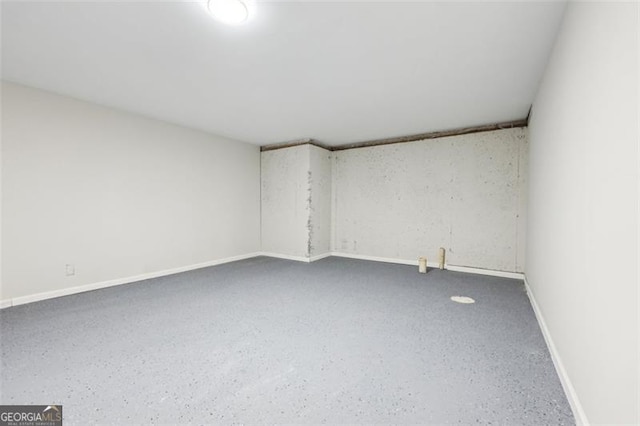 245 London Ln, Hiram, GA 30141 - empty room with baseboards and speckle patterned floor