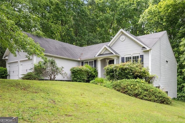 245 London Ln, Hiram, GA 30141 - ranch-style home with a front yard and an attached garage