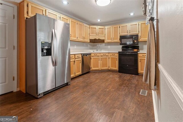 233 Oakridge Dr, Cartersville, GA 30121 - kitchen with black appliances, light countertops, a sink, light brown cabinetry, and dark wood-type flooring