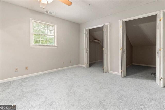 233 Oakridge Dr, Cartersville, GA 30121 - unfurnished bedroom featuring carpet, baseboards, a ceiling fan, and a closet
