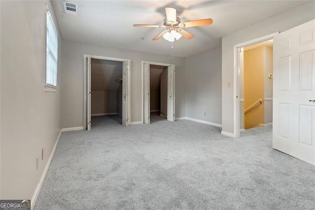 233 Oakridge Dr, Cartersville, GA 30121 - unfurnished bedroom featuring carpet, baseboards, and a ceiling fan