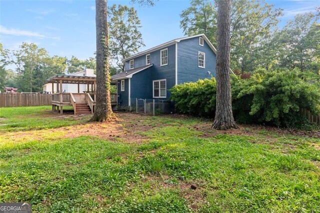 233 Oakridge Dr, Cartersville, GA 30121 - rear view of property featuring a pergola and a wooden deck