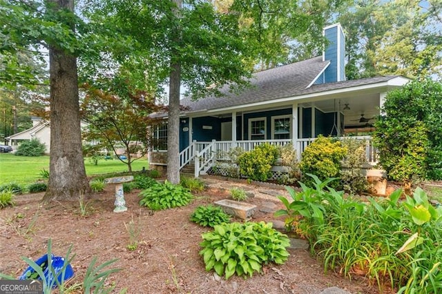 233 Oakridge Dr, Cartersville, GA 30121 - view of front of property featuring a porch, roof with shingles, and a chimney