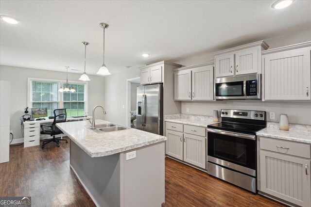 178 Stonebrook Way, Statesboro, GA 30458 - kitchen featuring appliances with stainless steel finishes, a sink, an island with sink, pendant lighting, and dark wood-style flooring
