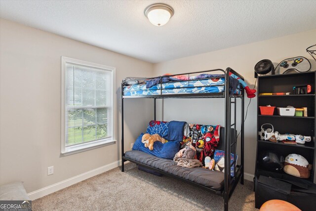 178 Stonebrook Way, Statesboro, GA 30458 - carpeted bedroom with baseboards and a textured ceiling