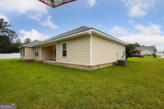 178 Stonebrook Way, Statesboro, GA 30458 - rear view of property featuring cooling unit and a shingled roof