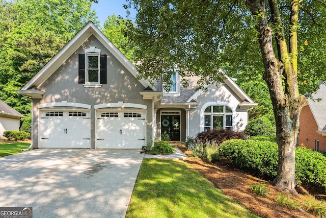 1010 Longcreek Pointe Pointe, Alpharetta, GA 30005 - view of front of property featuring concrete driveway, a garage, and stucco siding