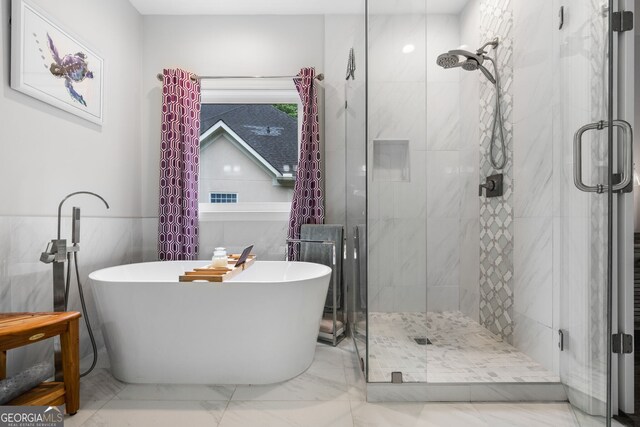 1010 Longcreek Pointe Pointe, Alpharetta, GA 30005 - full bath featuring a shower stall, marble finish floors, a freestanding bath, and tile walls