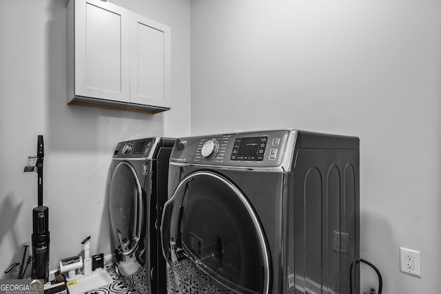 1010 Longcreek Pointe Pointe, Alpharetta, GA 30005 - laundry room featuring cabinet space and washer and clothes dryer